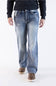 Front view of a model wearing True Luck Weller loose straight-leg jeans in a medium-to-dark wash.
