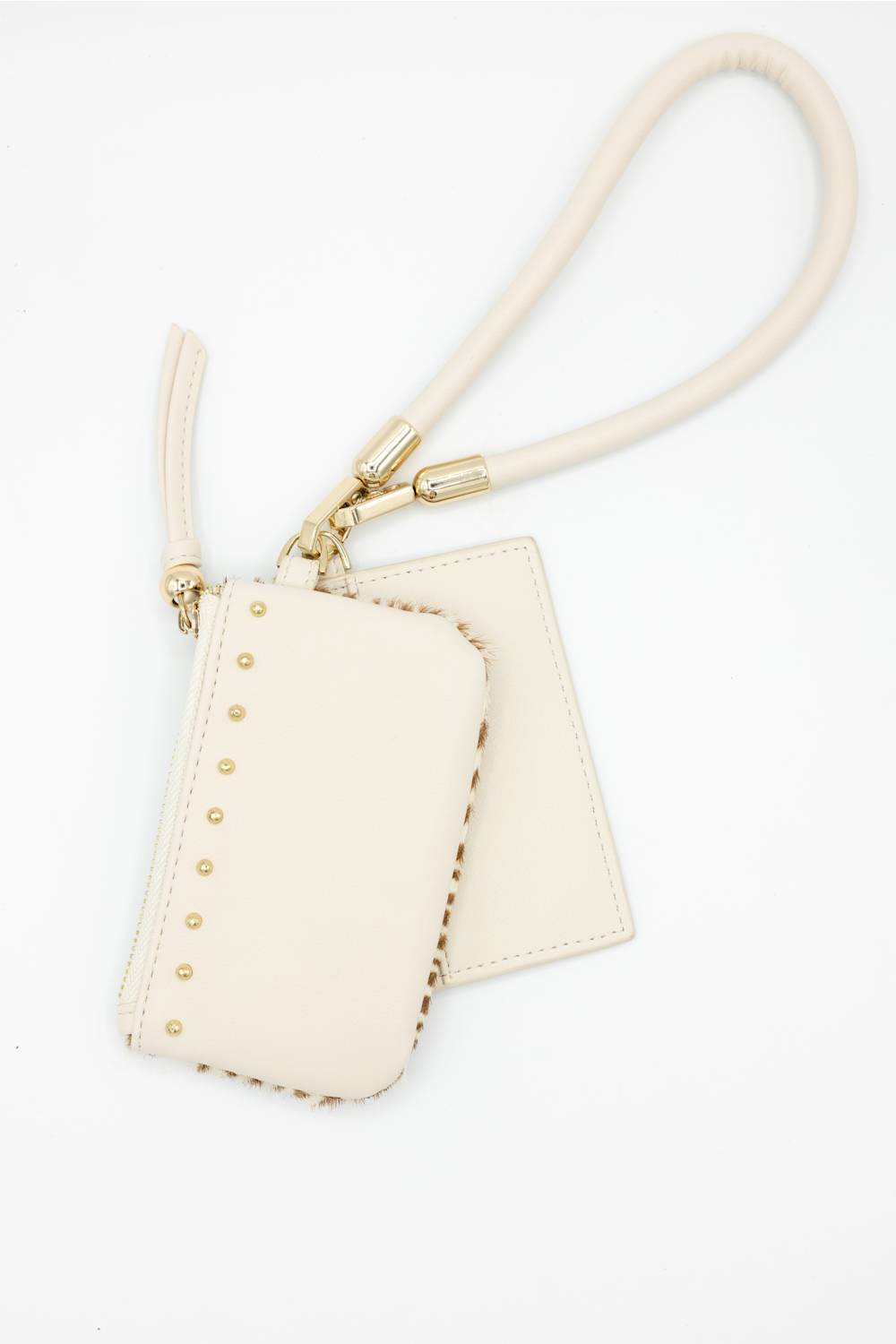 An off-white faux leather wristlet pouch with gold-tone hardware and a matching wrist strap, displayed on a clean white background.