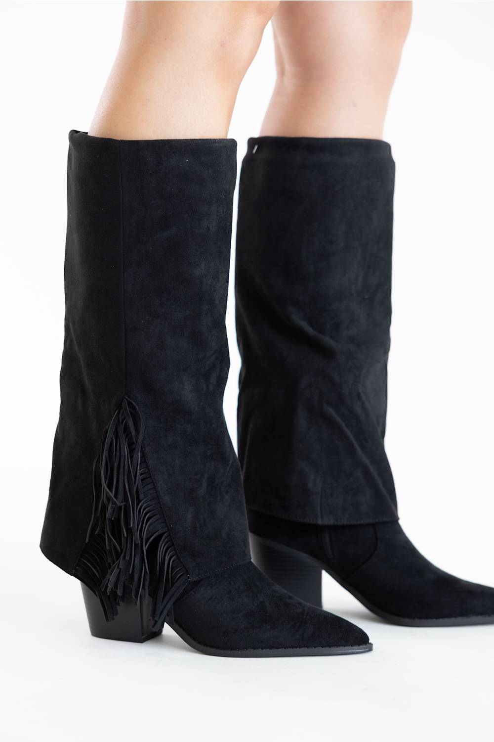 Black knee-high suede boots with block heels, shown from the back on a model against a white studio background.