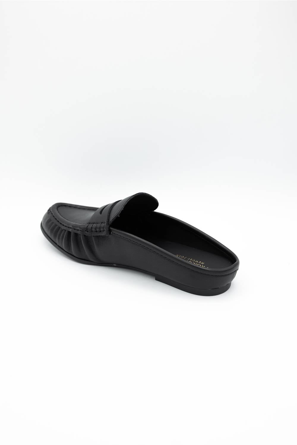 A single black leather loafer slip-on shoe with a decorative strap detail across the vamp, shown from a side profile view on a clean white background.