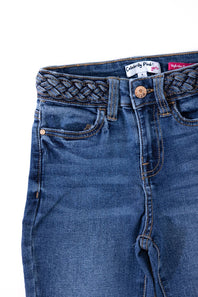 Close-up view of the front waistband and pockets on Celebrity Pink Girls Braided Waistband Flare Jeans in Nancy medium wash