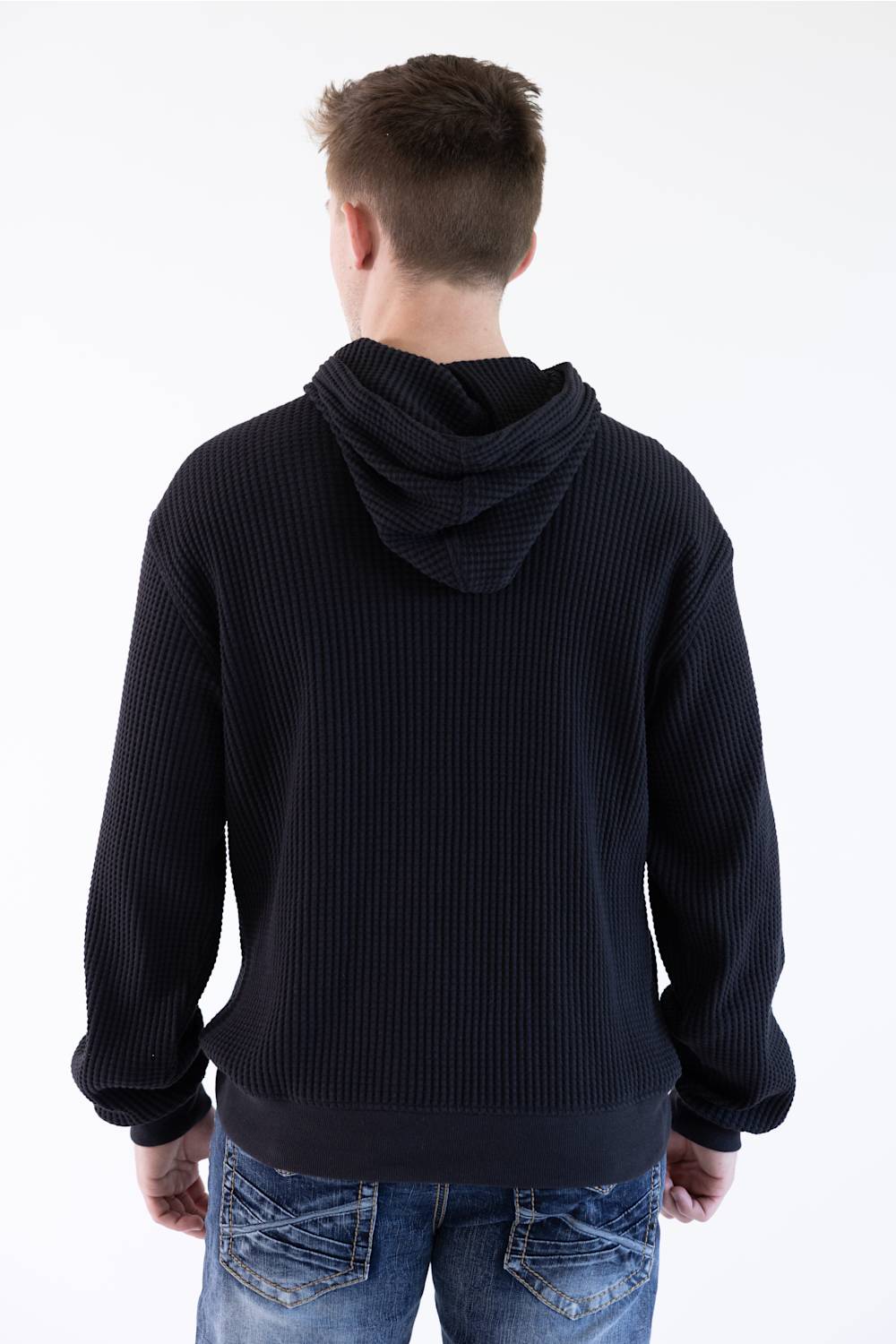 black hoodie on man