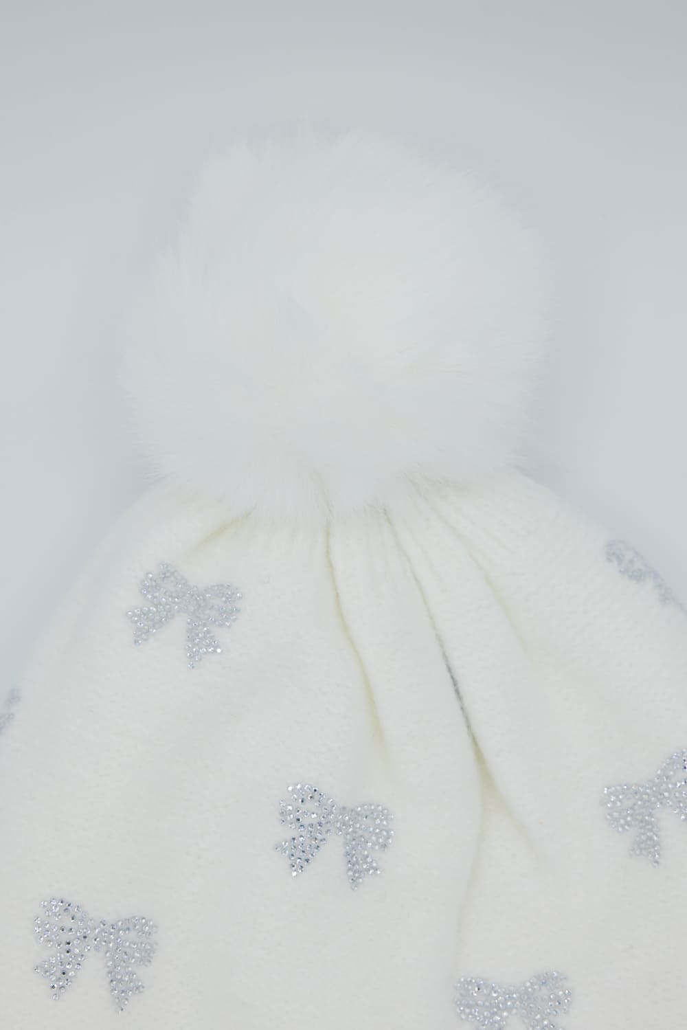 C.C. Bow Rhinestone Pom Beanie for Women in White