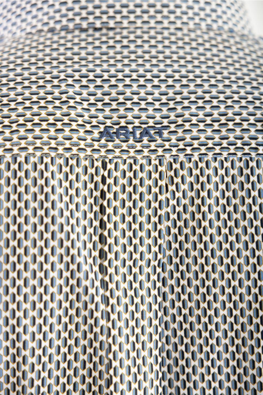 Close-up of a textured metallic mesh surface with a small embossed brand mark reading 'ARIAT'.