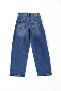Back view of Celebrity Pink youth girls' baggy wide-leg jeans in a medium wash denim laid flat against a white background.