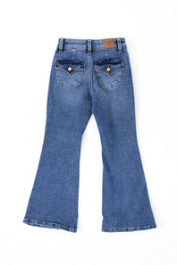 Back view of Celebrity Pink girls medium wash flare jeans showing two flap back pockets with button closures.
