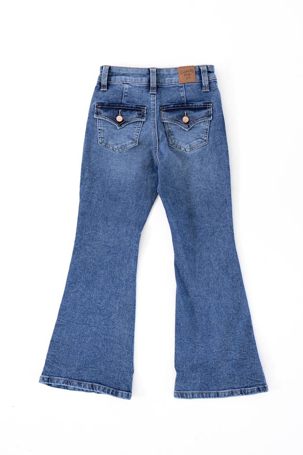 Back view of Celebrity Pink girls medium wash flare jeans showing two flap back pockets with button closures.