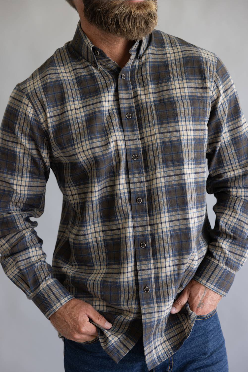 Brown and blue button down flannel shirt with long sleeves