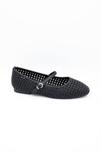 Image of a singular woven flat with a  strap across the ankle 