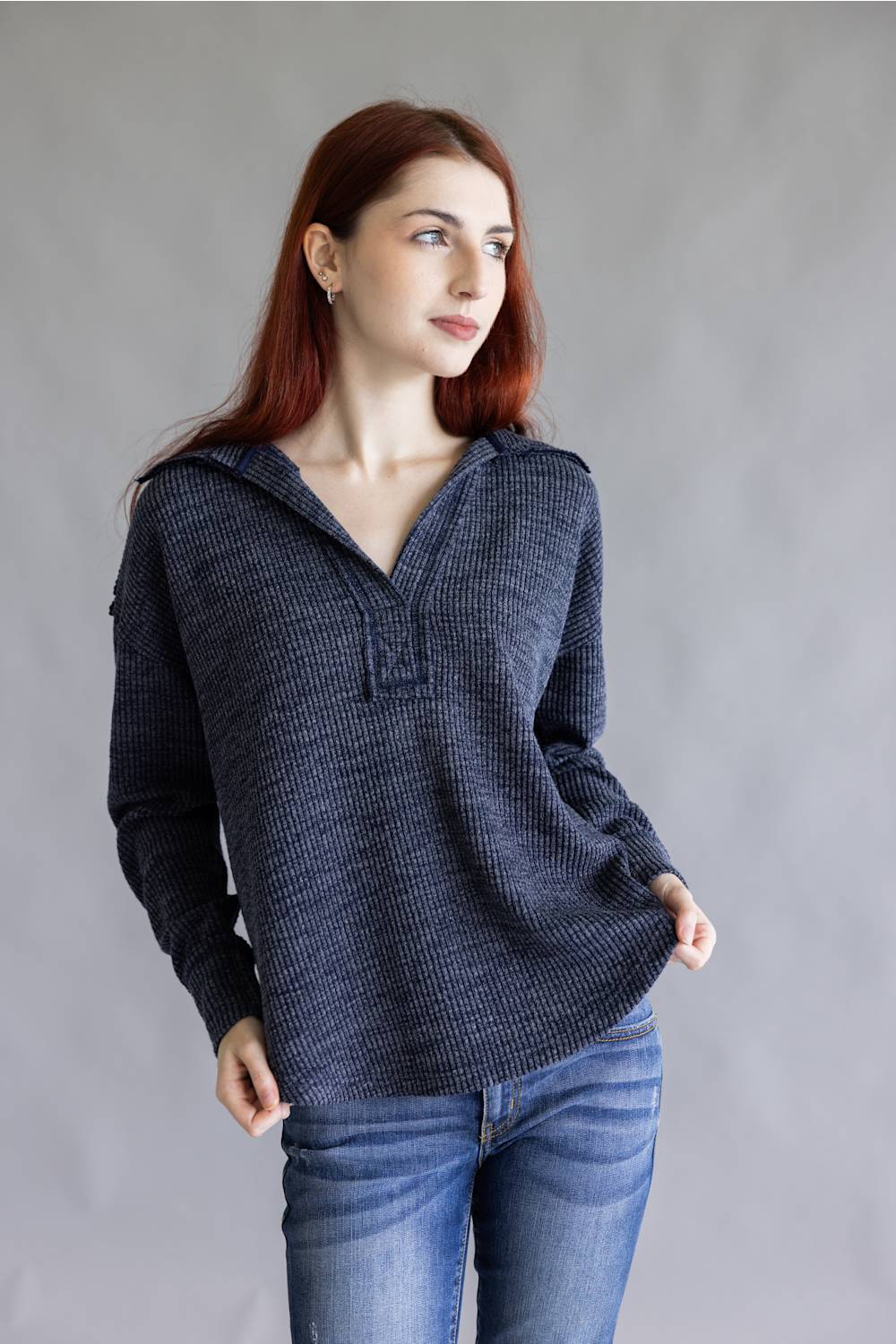 Ribbed v-neck sweater top with long sleeves and exposed seams