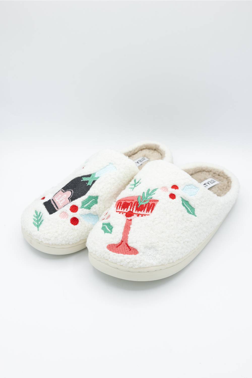  white slipper featuring festive holiday drinks 