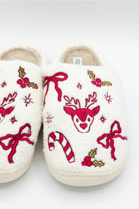 close up of holiday themed slippers 