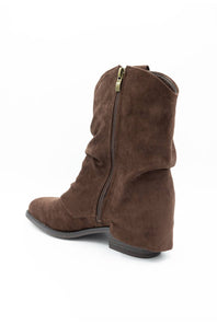 A brown suede ankle boot with a side zipper, shown from a rear three-quarter angle on a white background.