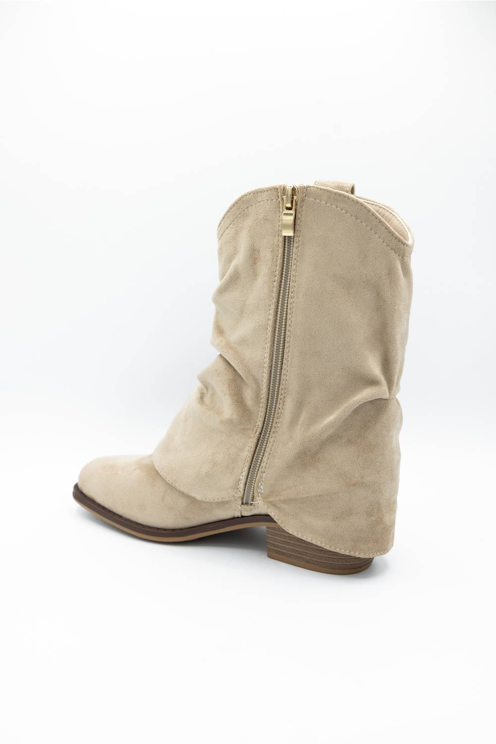 A beige suede western-style ankle boot with a side zipper and low block heel, shown from a rear three-quarter angle on a white background.