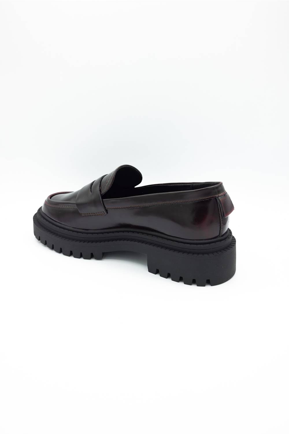 MIA Henrik Platform Loafers in wine red leather, featuring a chunky lug sole, round moc toe, and side-rear view of the heel and platform detail, displayed against a plain white background.