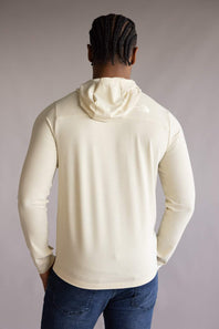 Full back view  a person wearing of the The North Face Adventure Keep Climbing Hoodie in Desert Taupe, with jeans on a plain background