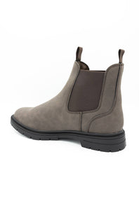 A single taupe-brown suede Chelsea boot with a dark brown elastic side panel and a black lug sole, shown from a side profile view on a white background.