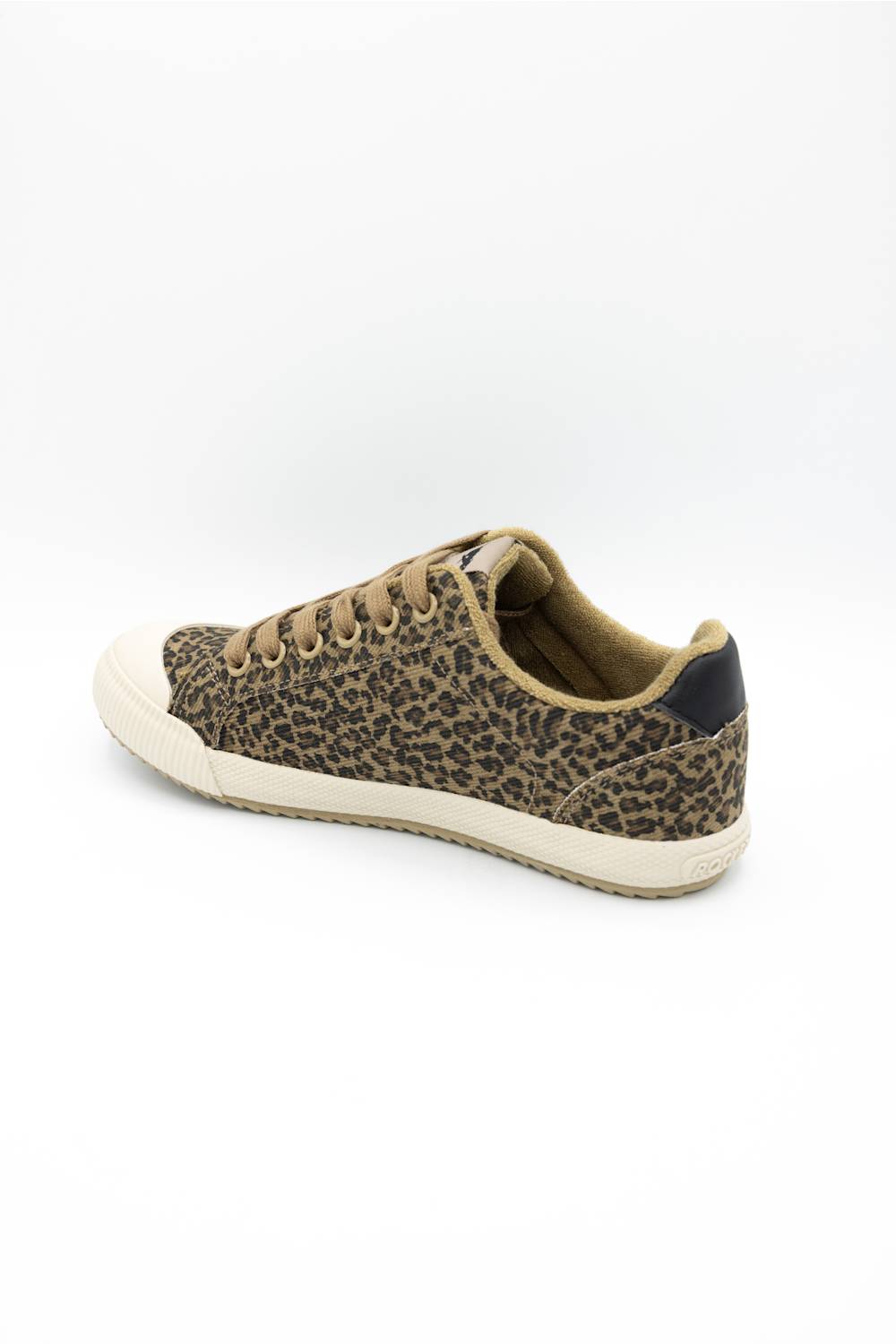 A low-top canvas sneaker featuring a brown and black leopard print pattern, tan laces, and a thick cream rubber toe cap and sole, shown against a plain white background.