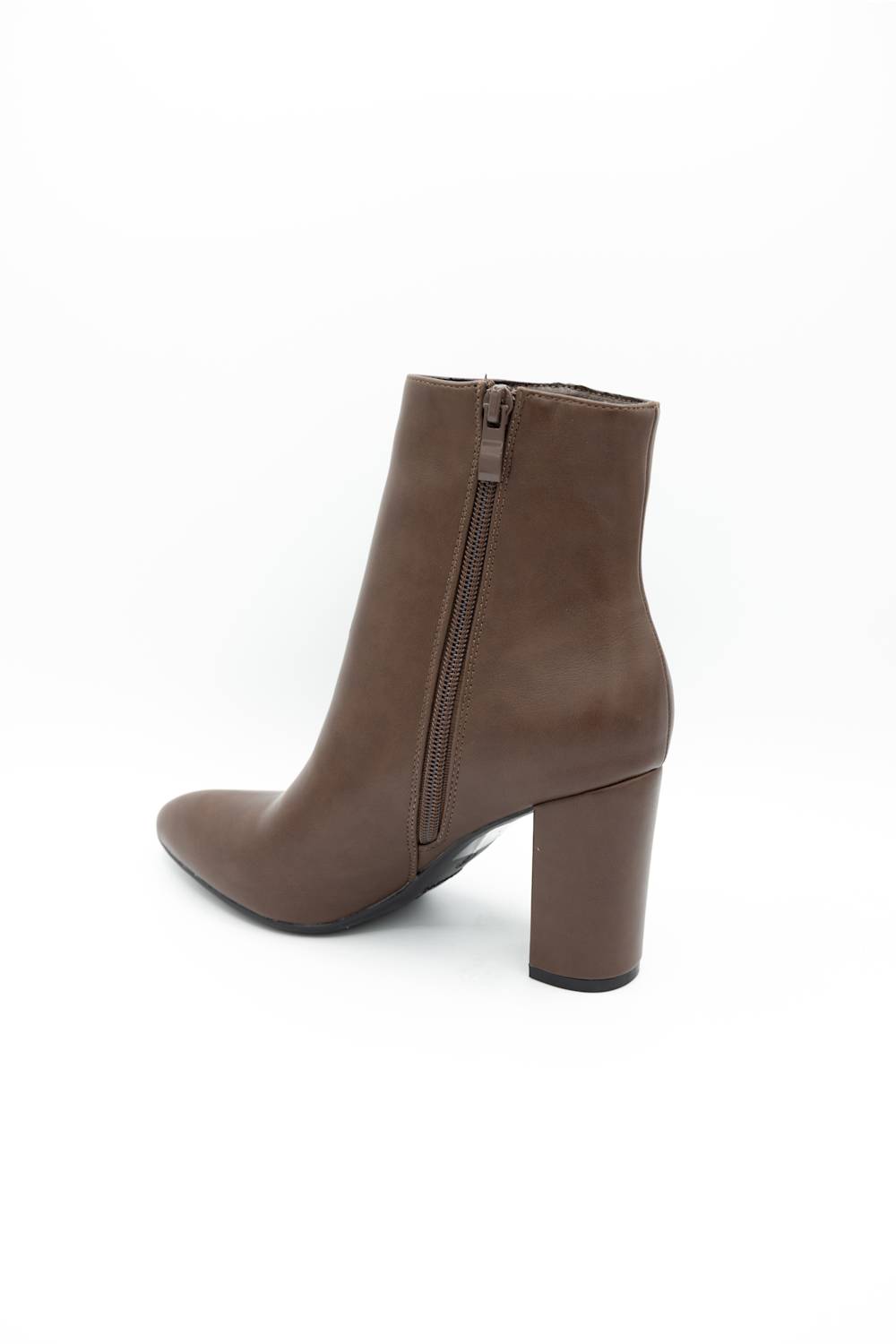 A brown leather ankle boot with a block heel and side zipper, shown from a rear three-quarter angle on a white background.