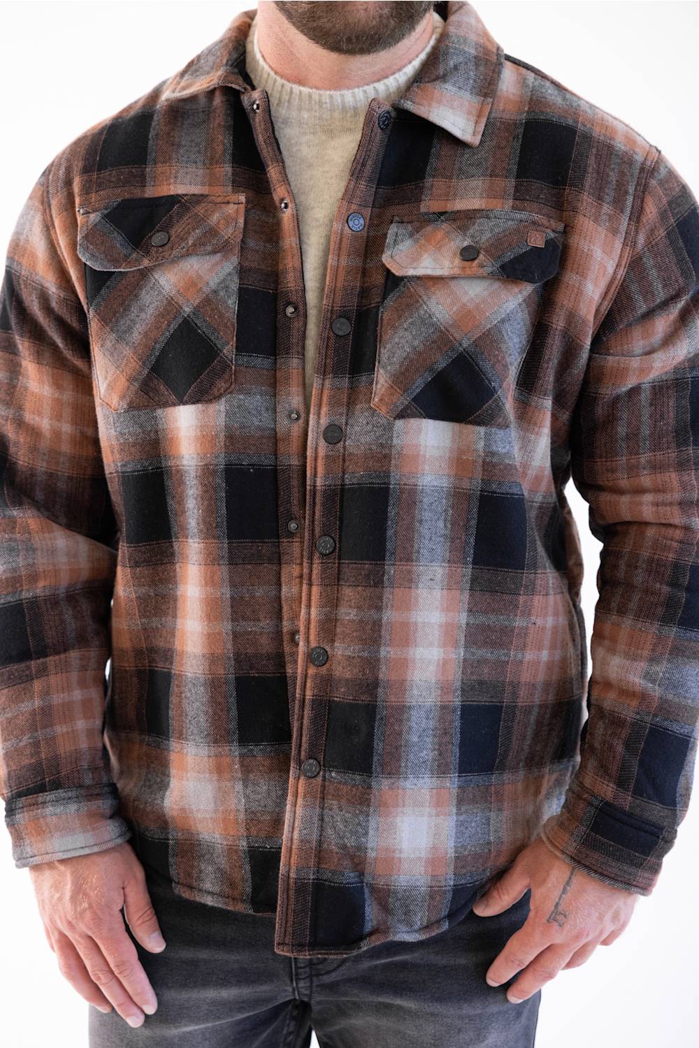 Matix Sherpa Lined Flannel Shacket in Black and Brown showing close up of shacket torso