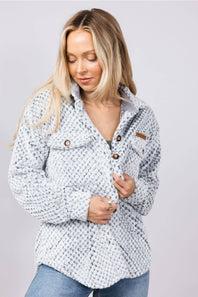Soft fleece button up shacket with cuffs, and tortoiseshell buttons and chest pockets 