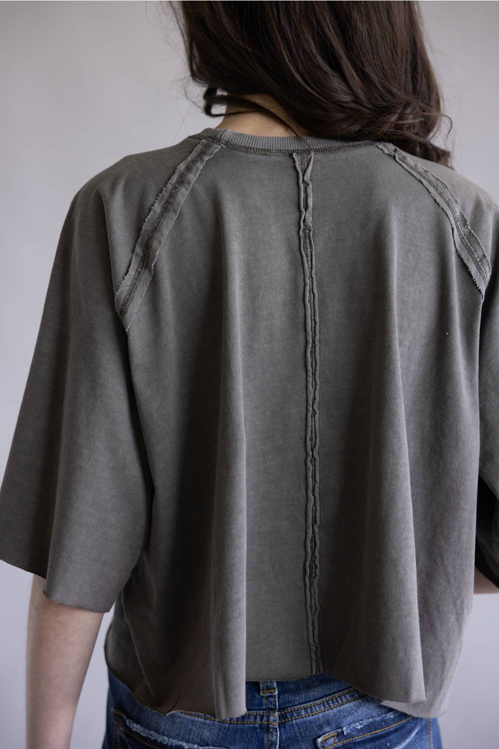 Simply Southern Washed Tee for Women in Grey; Person wearing a gray t-shirt on a plain background