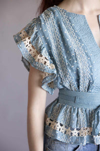 Embroidered Flutter Sleeve Peplum Top for Women in Chambray