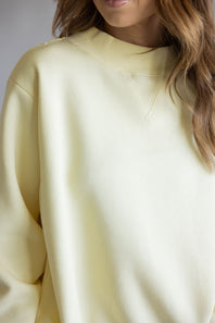 Things Between Mock Neck Fleece Pullover for Women in Butter Yellow