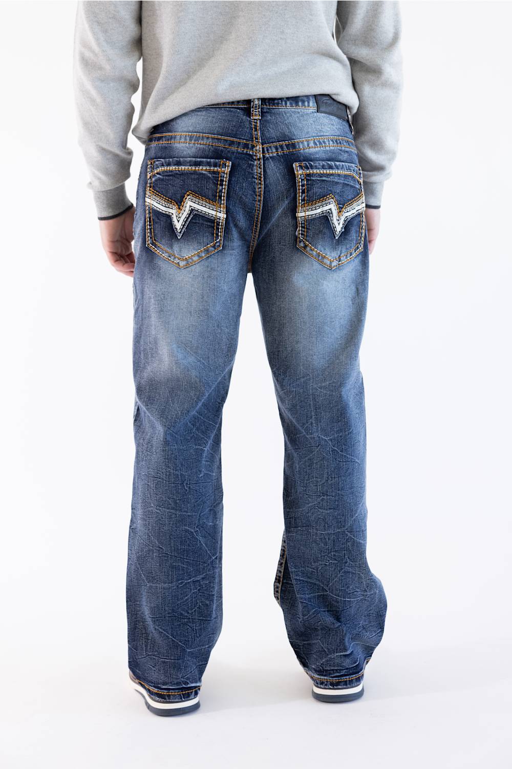 Back view of Men's True Luck Truman Loose Straight jeans in a dark wash, showcasing detailed contrast stitching, decorative embroidery on the back patch pockets, and a black logo patch at the waistband.