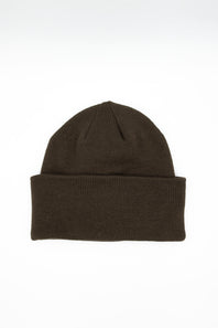 Back view of a plain dark chestnut brown ribbed knit beanie featuring a folded cuff hem against a solid white background.