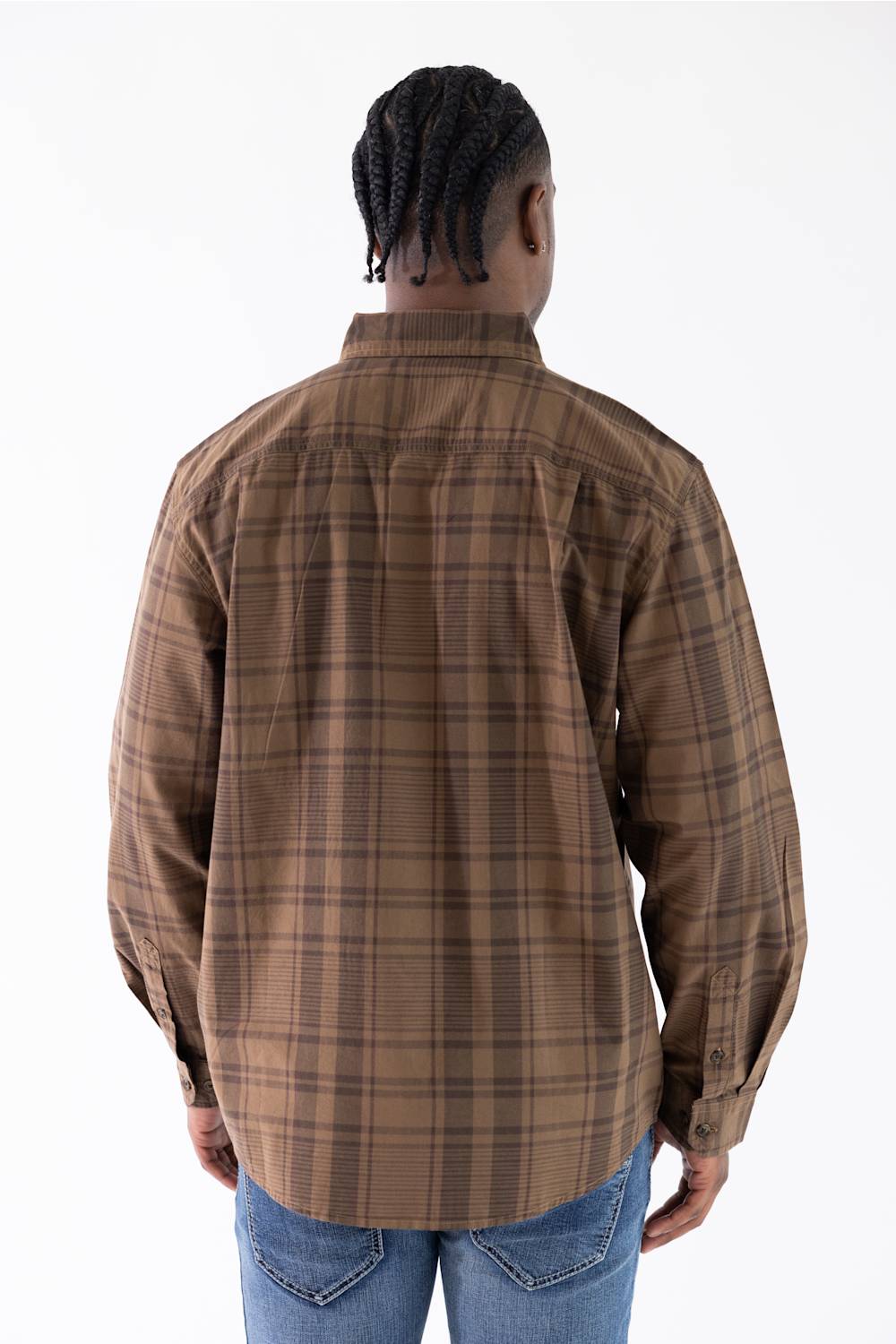 A man wearing a brown and tan plaid button-down shirt by Carhartt