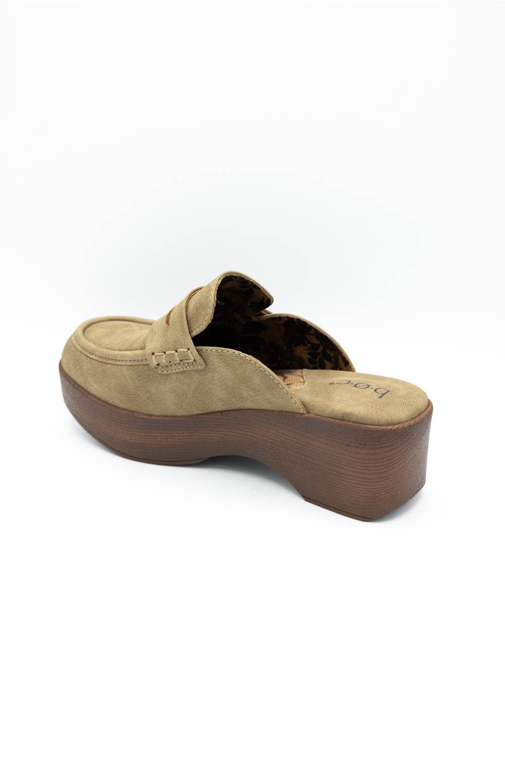 A single tan suede platform mule shoe with a brown wedge heel, shown from a three-quarters angle on a white background.