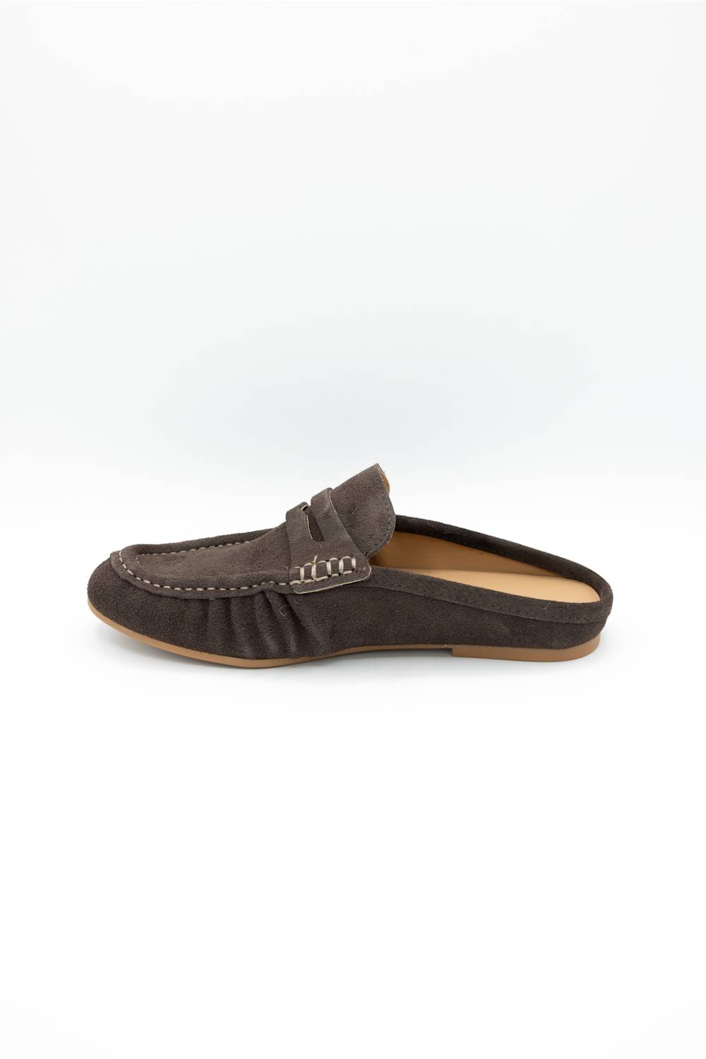A single dark brown suede mule loafer shown in profile against a clean white background.