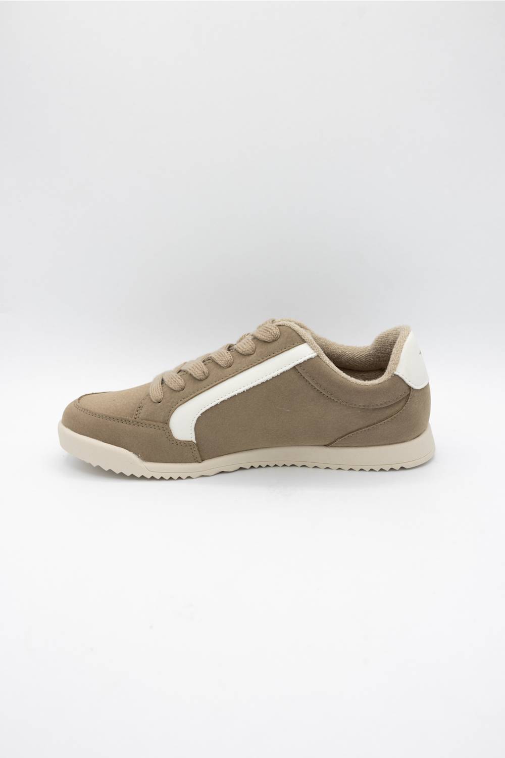 A low-top sneaker in taupe brown suede with a contrasting white side stripe, white heel tab, and a beige sole, shown from a side profile view against a light gray background.