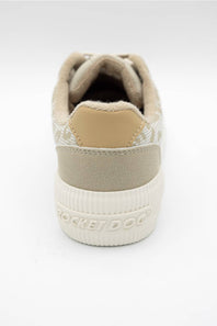 A close-up rear view of a Rocket Dog sneaker in beige and off-white, featuring a textured suede heel, patterned knit collar, and a thick ribbed white sole with the brand name embossed.