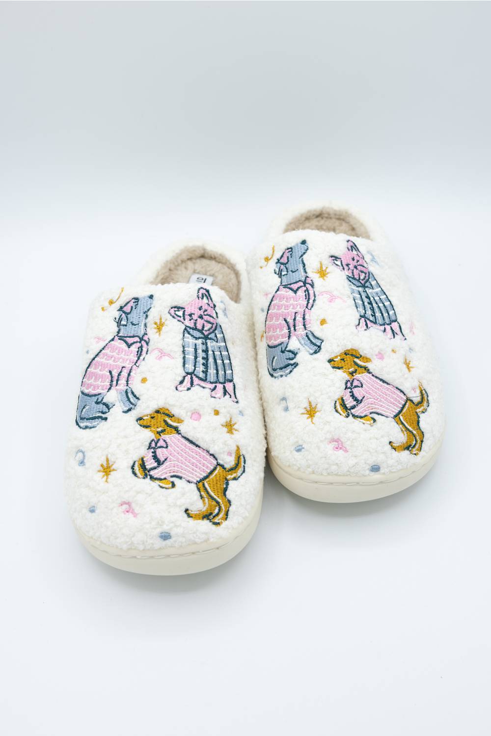 dog wearing pajamas design on comfortable sherpa house slippers