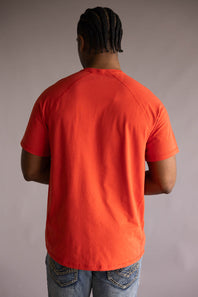 Back view of a person wearing the Carhartt Force Pocket T-Shirt for Men in Atomic Red