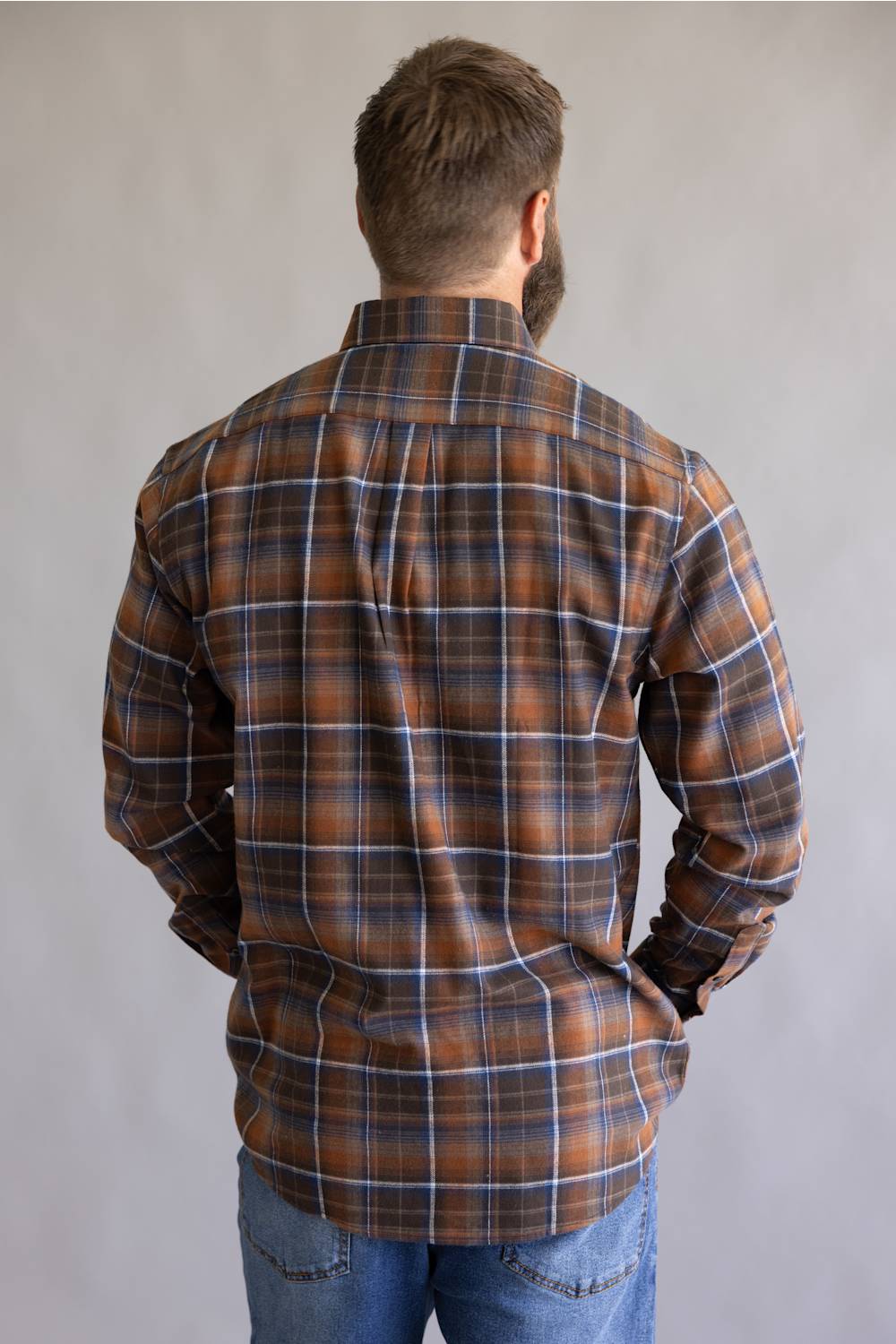 Orange and blue flannel patten, on a button down and long sleeve 