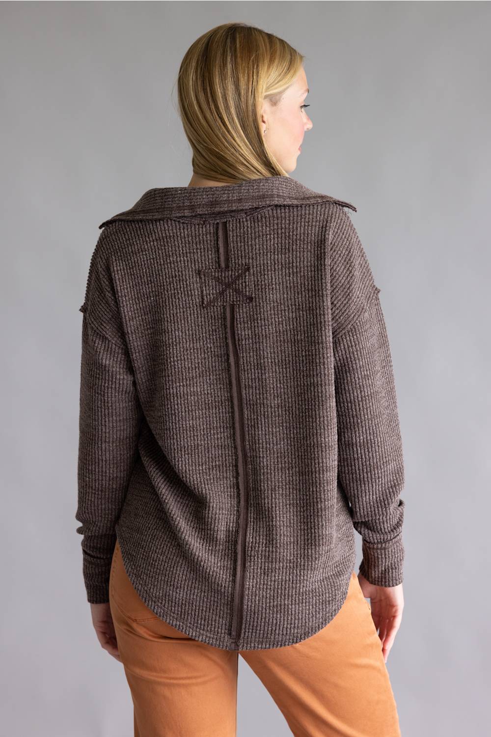 Long sleeve ribbed top in brown, with a deep collar v-neckline 