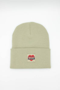 Front view of the olive green Carhartt heart patch beanie against a neutral background.