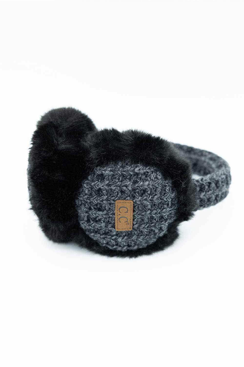 Charcoal grey C.C. heather knit earmuffs featuring a soft black faux fur lining and a branded C.C. logo patch on the side.