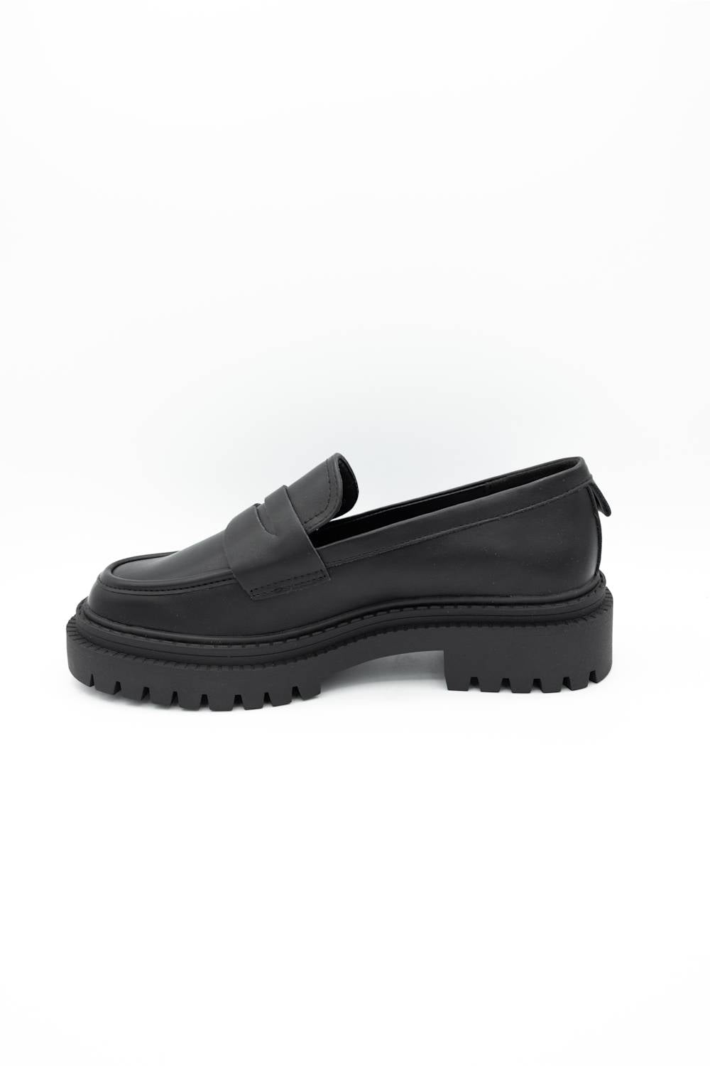 Black dress shoes with textured details on a white background