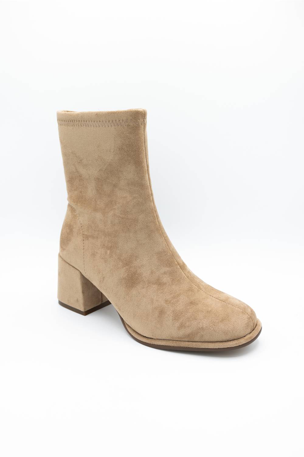 A single beige suede ankle boot with a chunky block heel and square toe, photographed from a three-quarters angle on a white background.