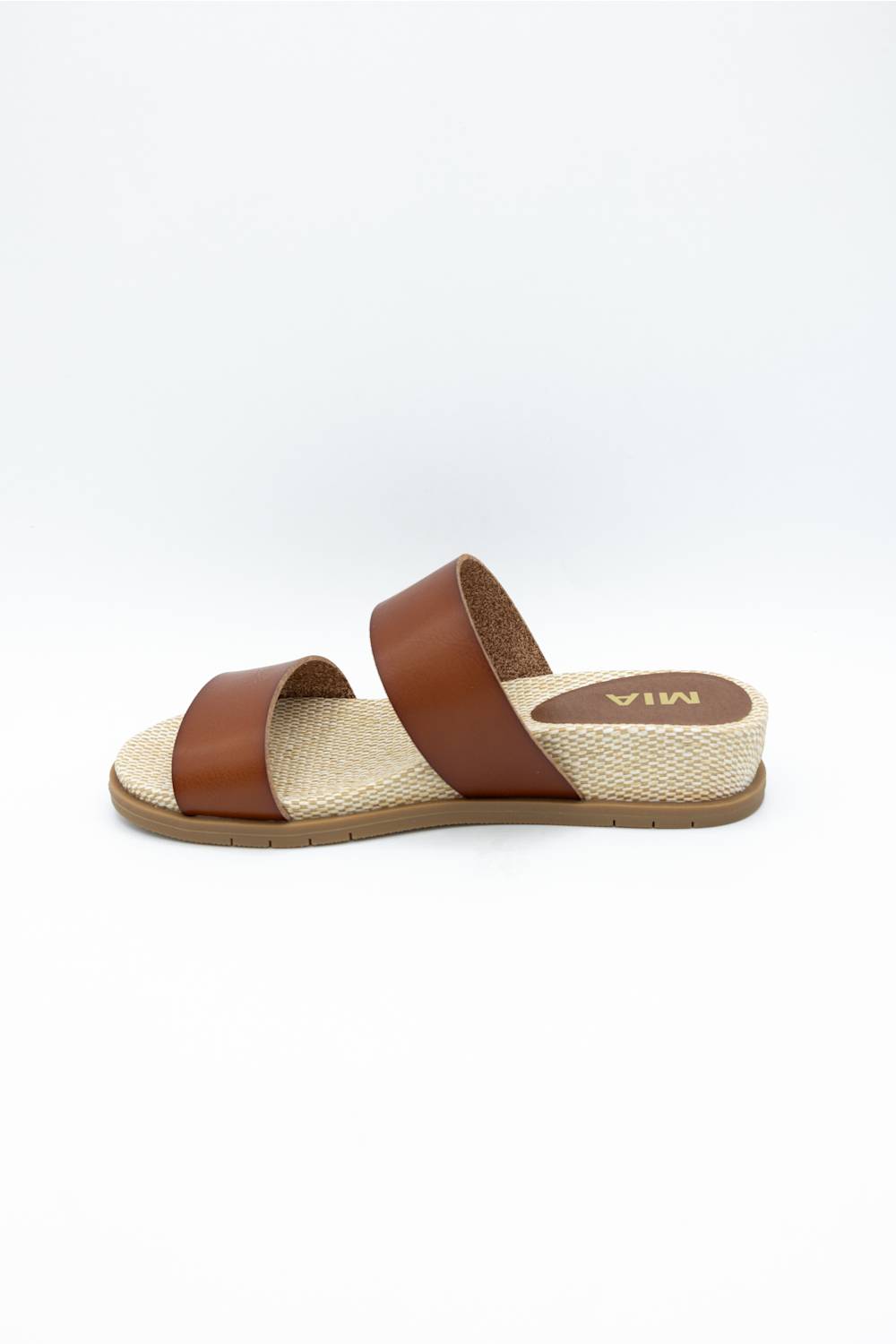 MIA Yelena Slide Sandals for Women in Cognac; Brown sandal with a textured sole on a white background