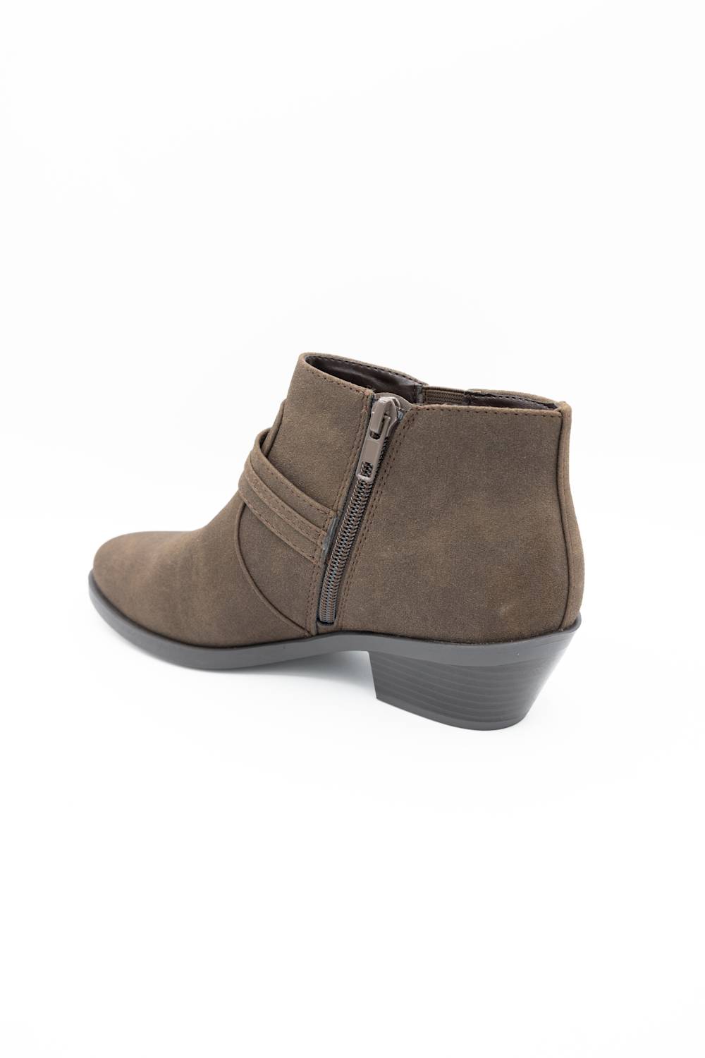 A brown suede ankle boot with a side buckle strap and a low block heel, shown from a three-quarters angle on a white background.