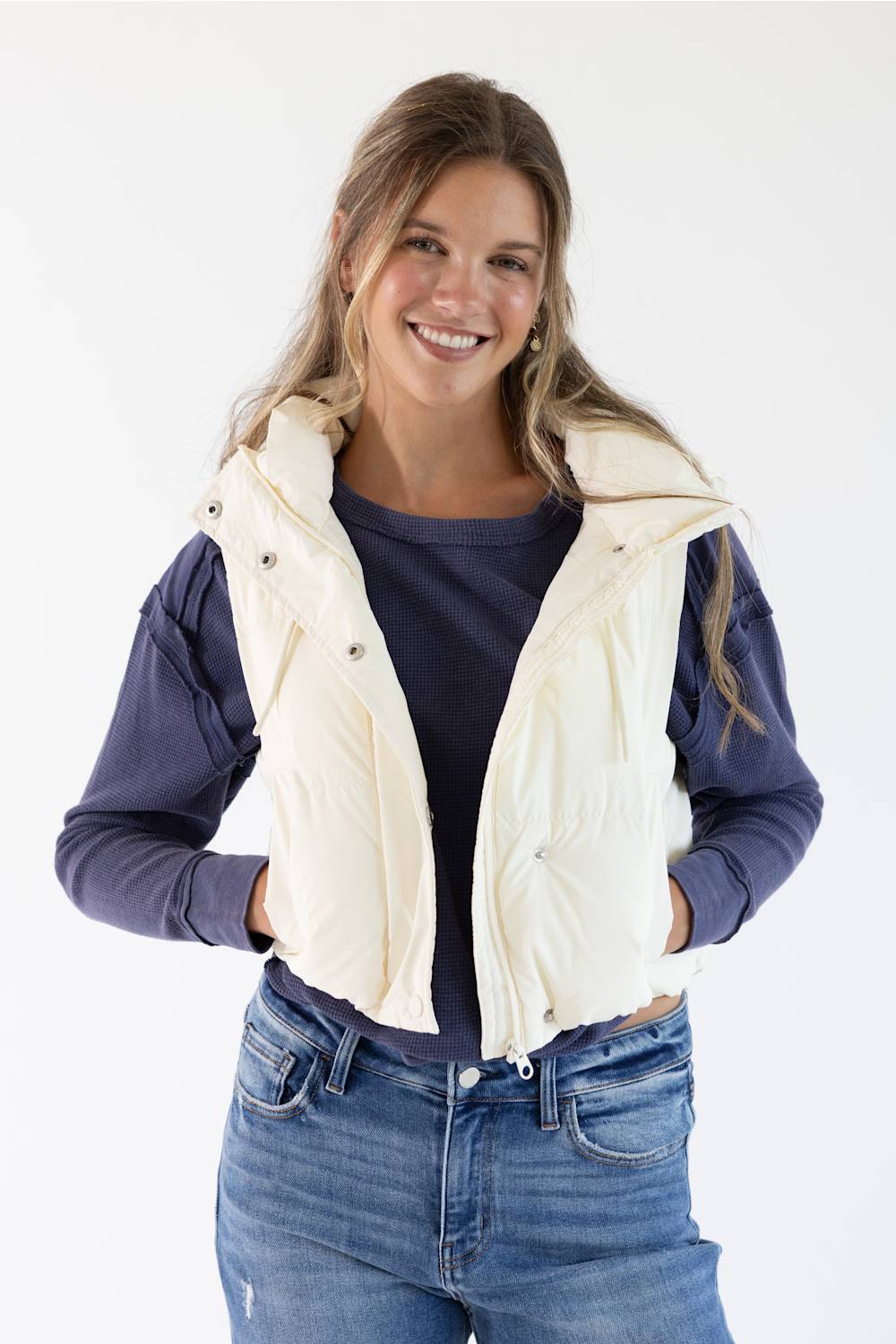 Front view of the off-white Love Tree hooded faux leather puffer vest with snap buttons, zipper closure, and side pockets.