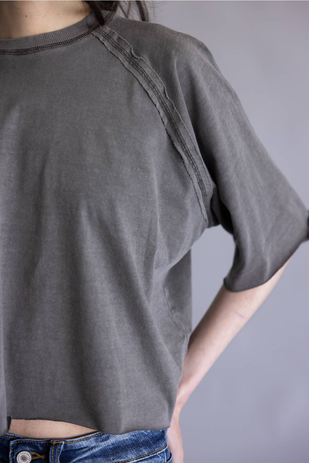 Simply Southern Washed Tee for Women in Grey; Person wearing a gray t-shirt with a plain background