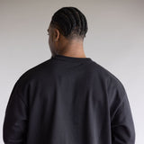 The North Face Evolution Oversized Crew Sweatshirt for Men in Black