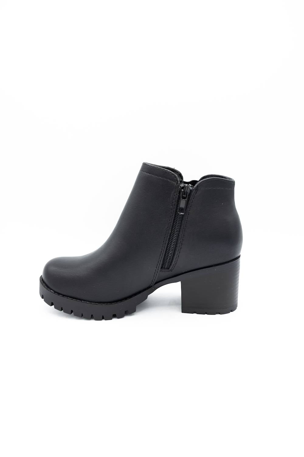 A single black leather ankle boot with a chunky block heel and a textured lug sole, shown from a three-quarters angle on a white background.