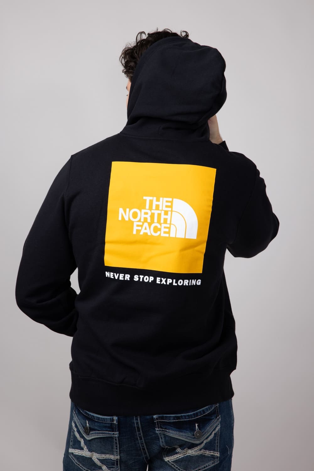 The North Face Box Logo Hoodie for Men in Black/Yellow